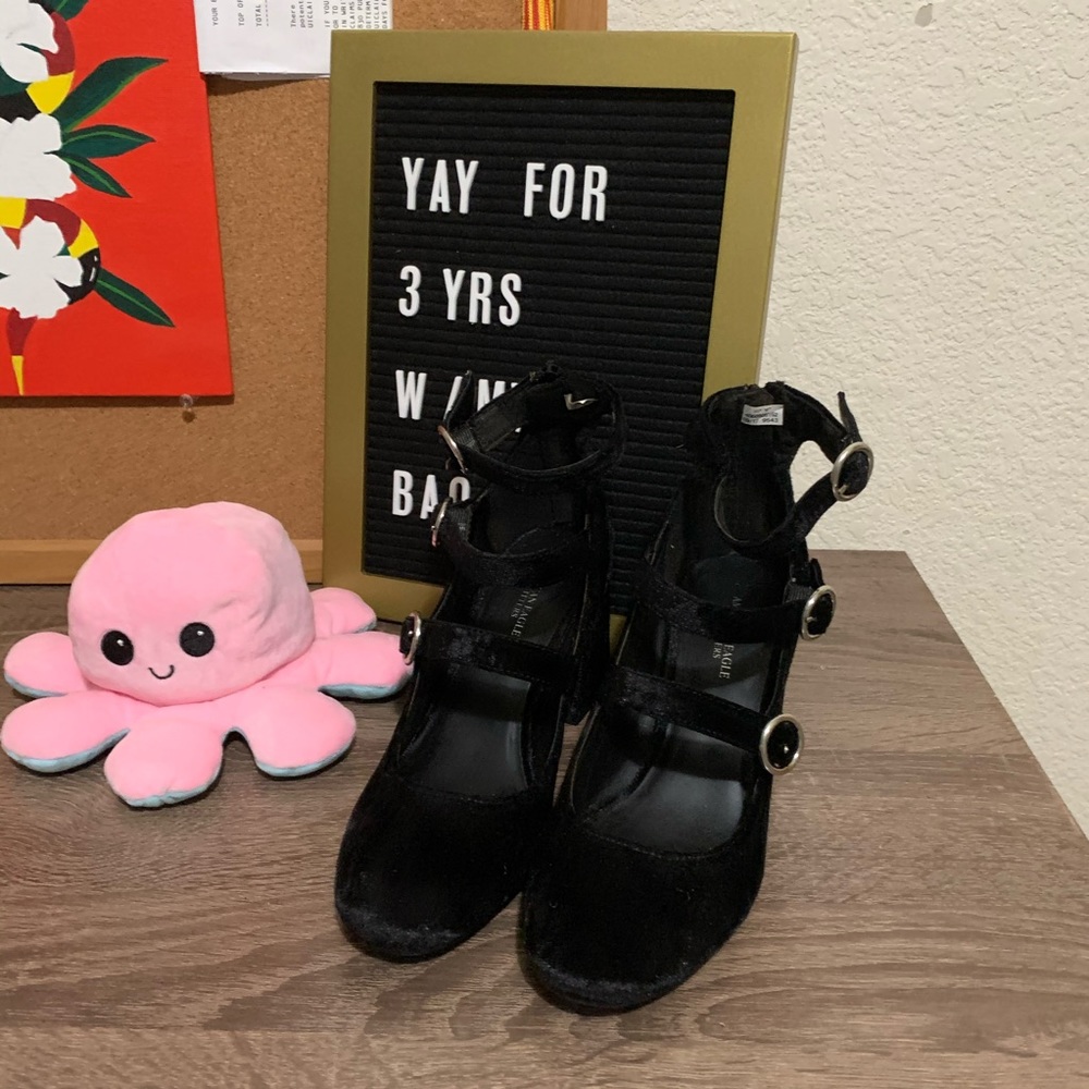 Black buckle block heels